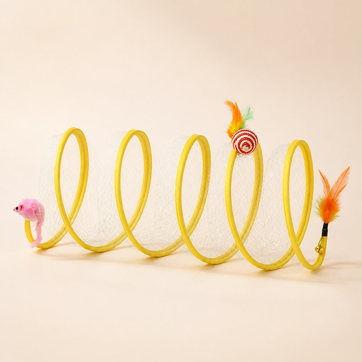 Coil Chase foldable yellow spiral cat toy studio view